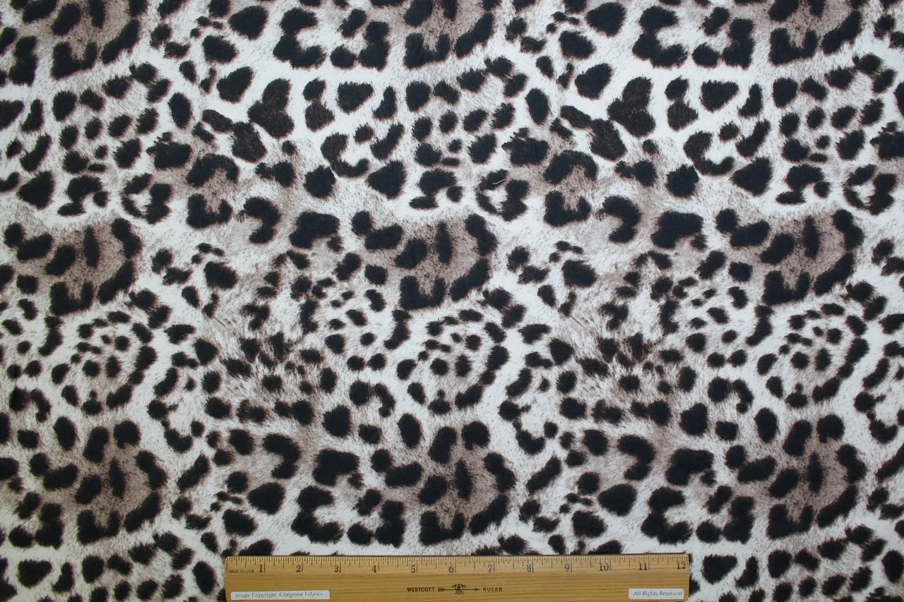 1 3/8 yards of Big Cat Print Cotton Flannel - Browns on White